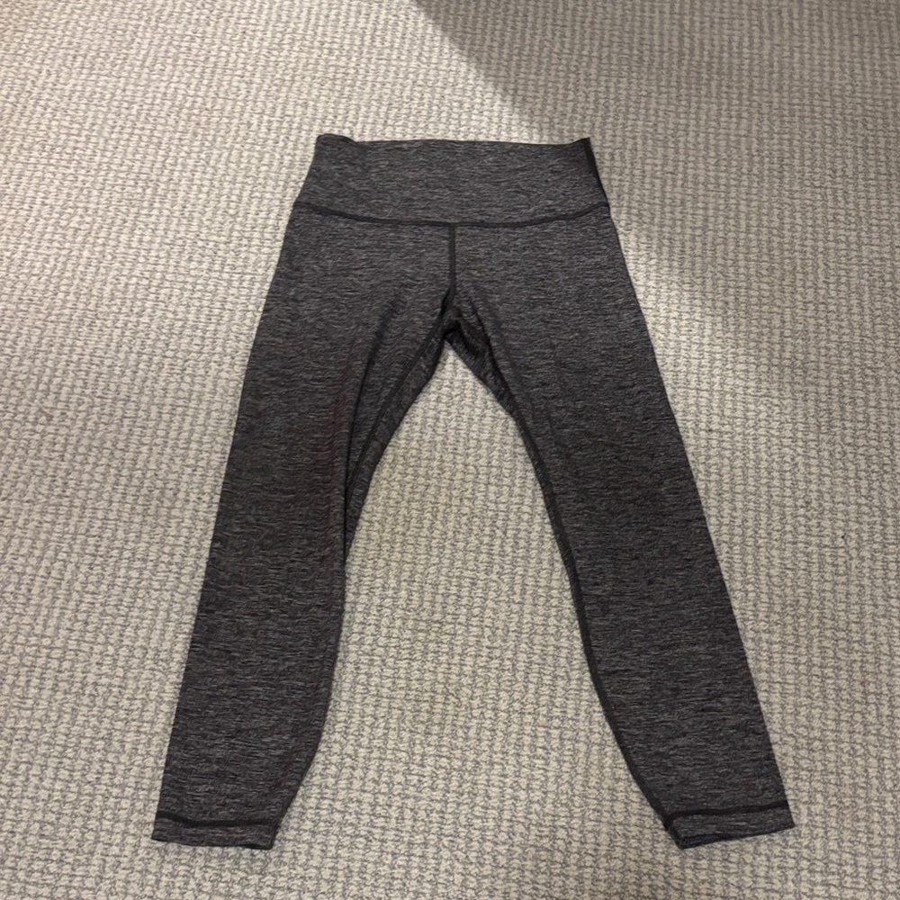 LULULEMON Wunder Under High-Rise Tights in a heathered black/gray Luon fabric